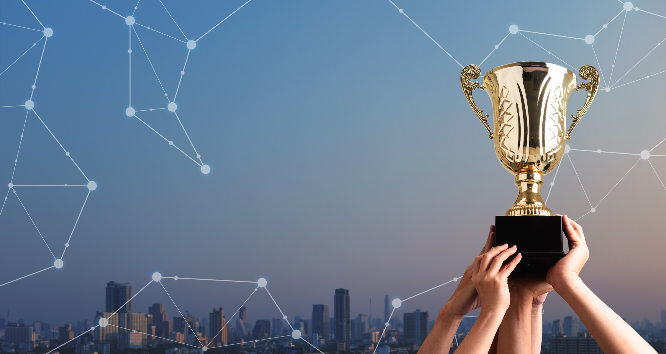 Winning team raise trophy cup with digital background, digital achievement conceptual